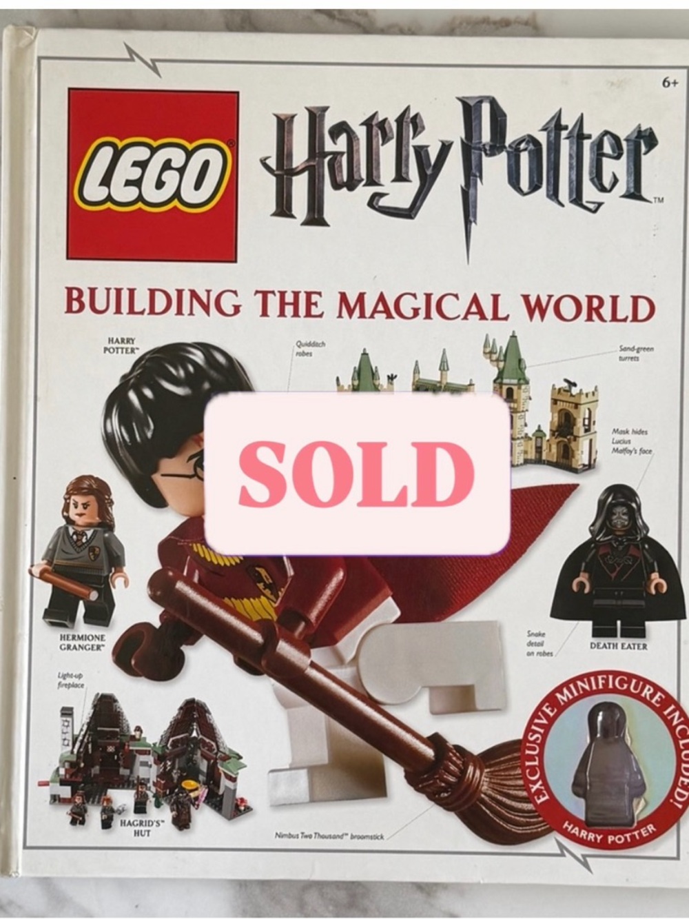 LEGO Harry Potter Building the Magical World Book with Red and Black